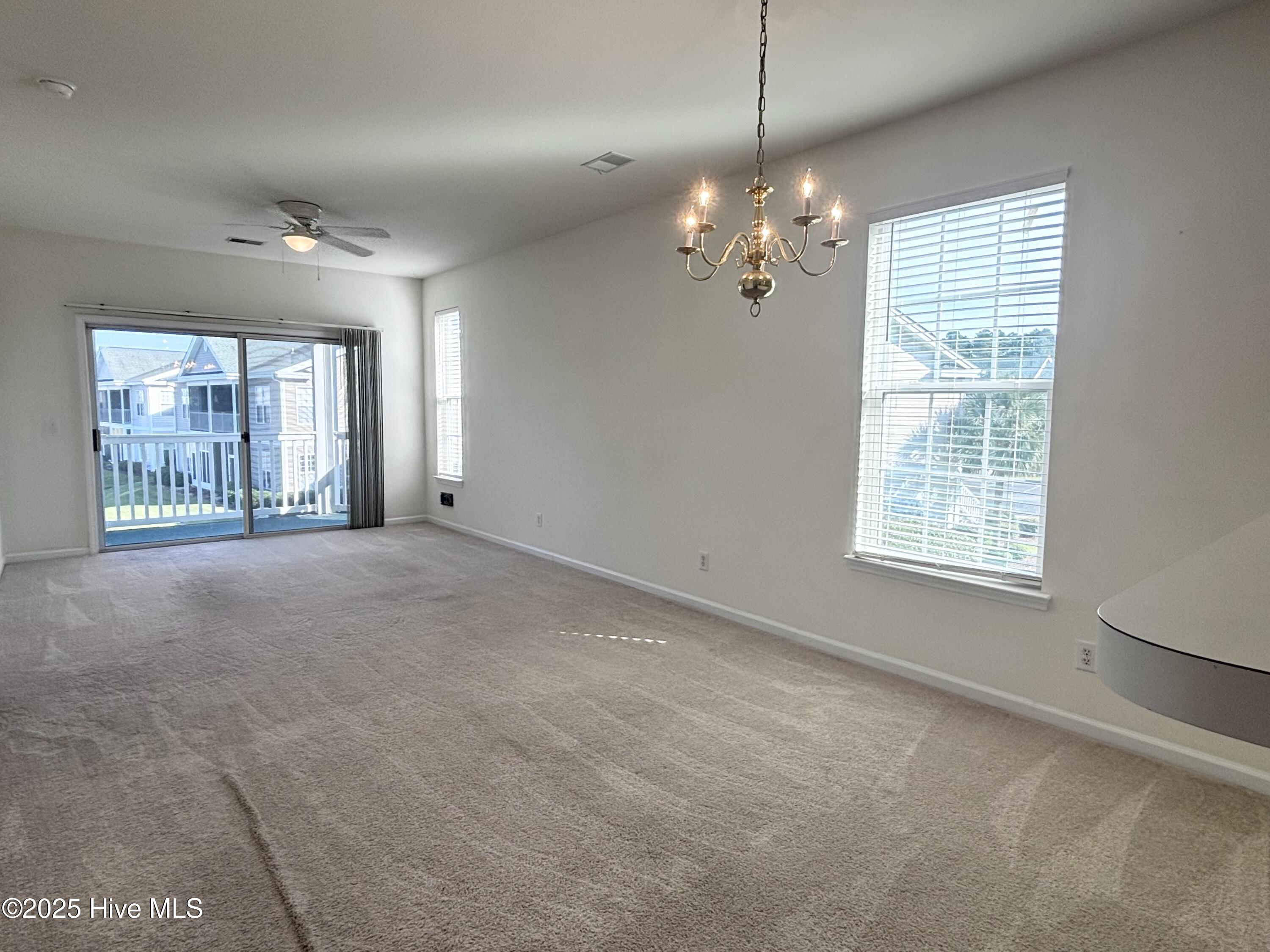 7509 Moorhen Lane Southwest, Unit 52D Sunset Beach, NC 28468 - Photo 7 of 39 Living room & Dining room
