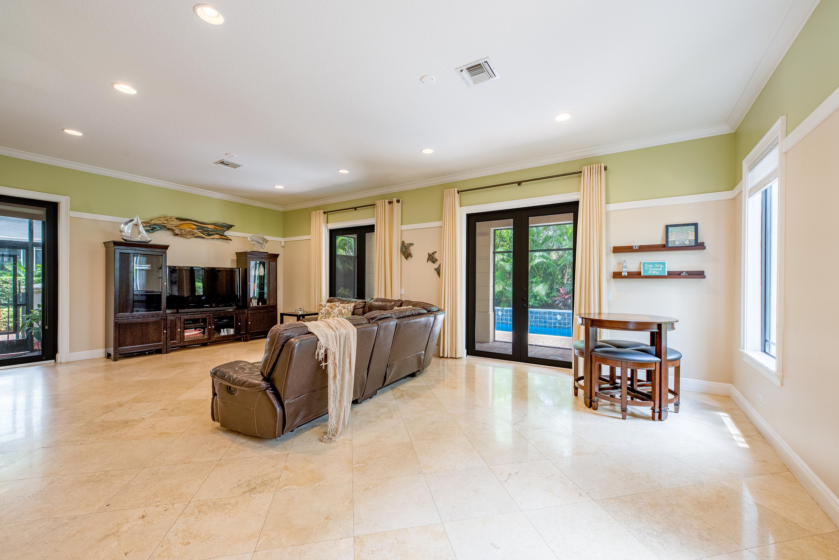 568 Northwest Browning Way Boca Raton, FL 33432 - Photo 13 of 51 Dining Room To Living Room