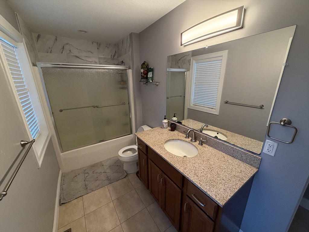17 Two Ponds Road Belchertown, MA 01007 - Photo 23 of 23 a bathroom with a granite countertop sink toilet and shower
