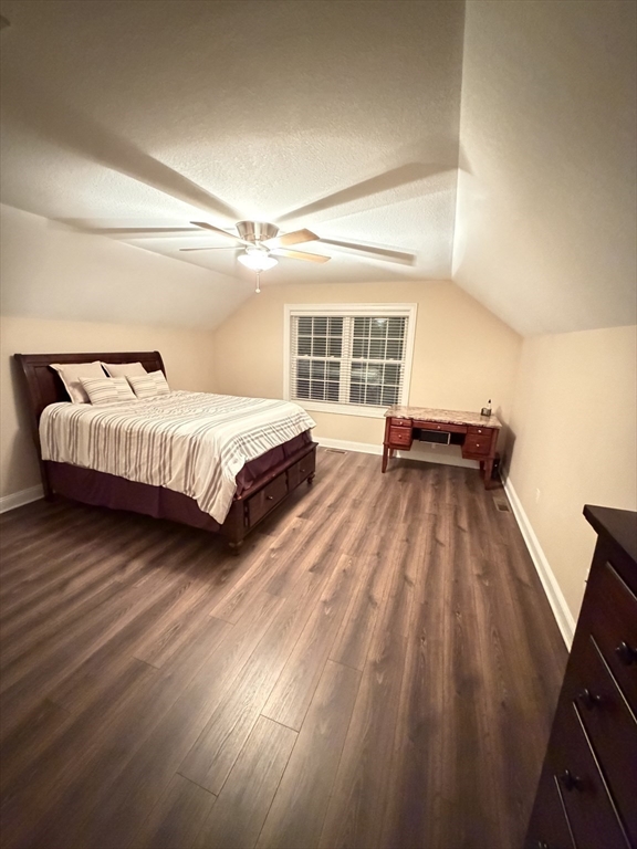 17 Two Ponds Road Belchertown, MA 01007 - Photo 5 of 23 a spacious bedroom with a bed and wooden floor
