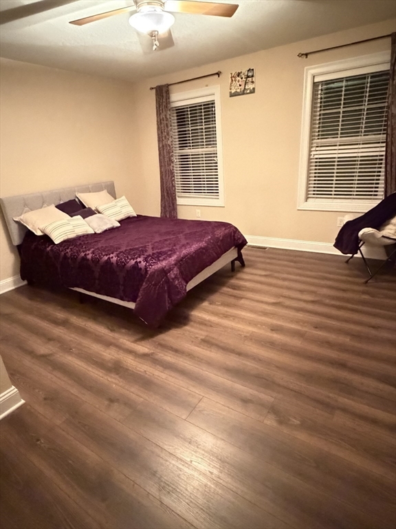 17 Two Ponds Road Belchertown, MA 01007 - Photo 8 of 23 a bedroom with a bed and wooden floor