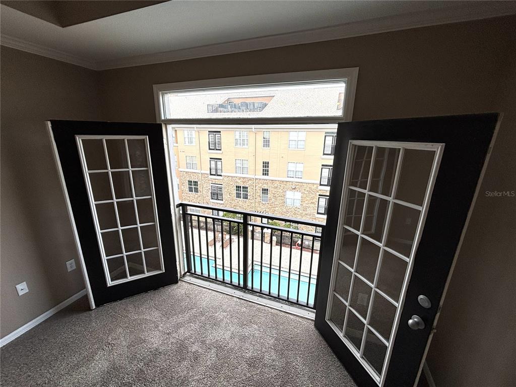 4221 West Spruce Street, Unit 1418 Tampa, FL 33607 - Photo 2 of 22 a view of an empty room with a fireplace