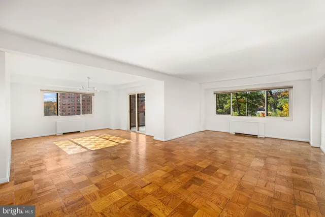 a view of an empty room with a window