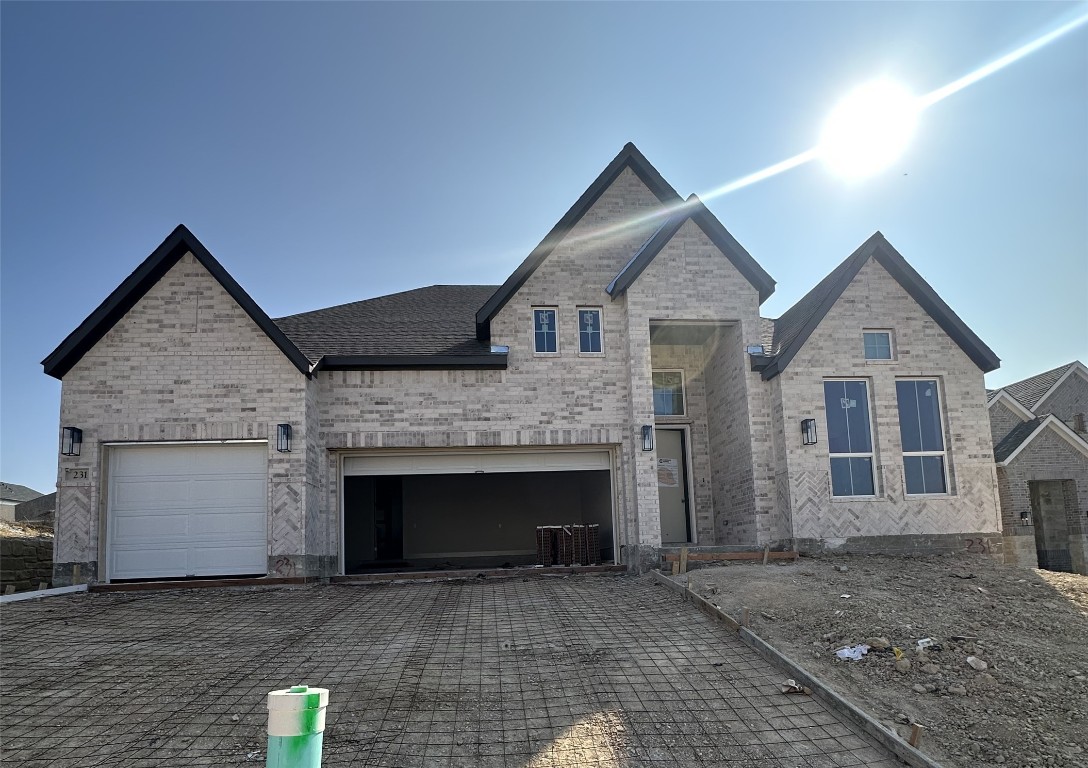 a front view of a house with yard