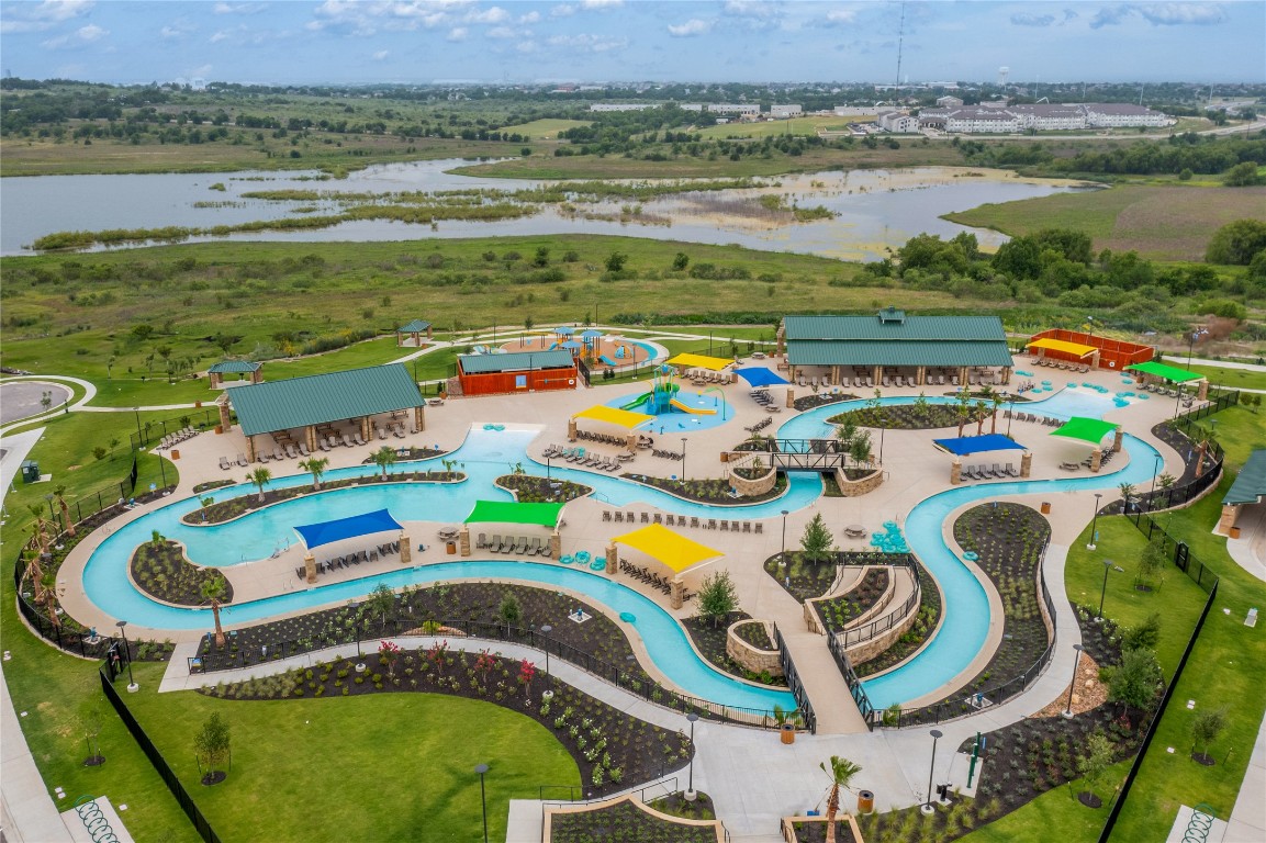 231 Begonia Street Buda, TX 78610 - Photo 10 of 27 a bird view of a play table and chairs in a lake