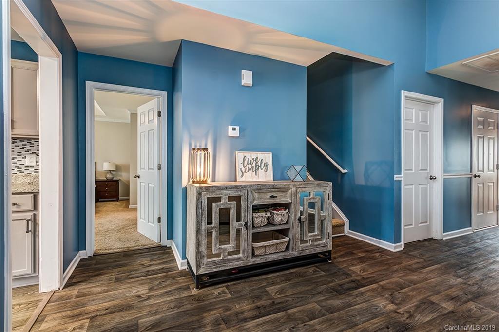 2736 Rustic Ridge Court Rock Hill, SC 29730 - Photo 21 of 23 a view of a livingroom with wooden floor and stairs