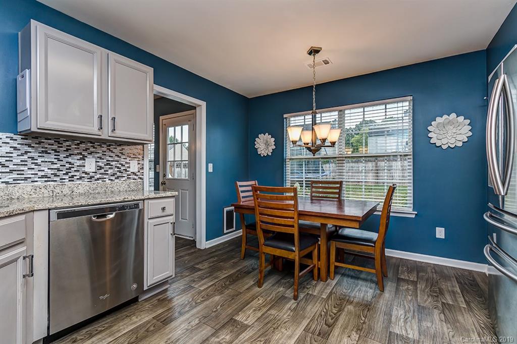 2736 Rustic Ridge Court Rock Hill, SC 29730 - Photo 7 of 23 a view of a dining room with furniture window and outside view