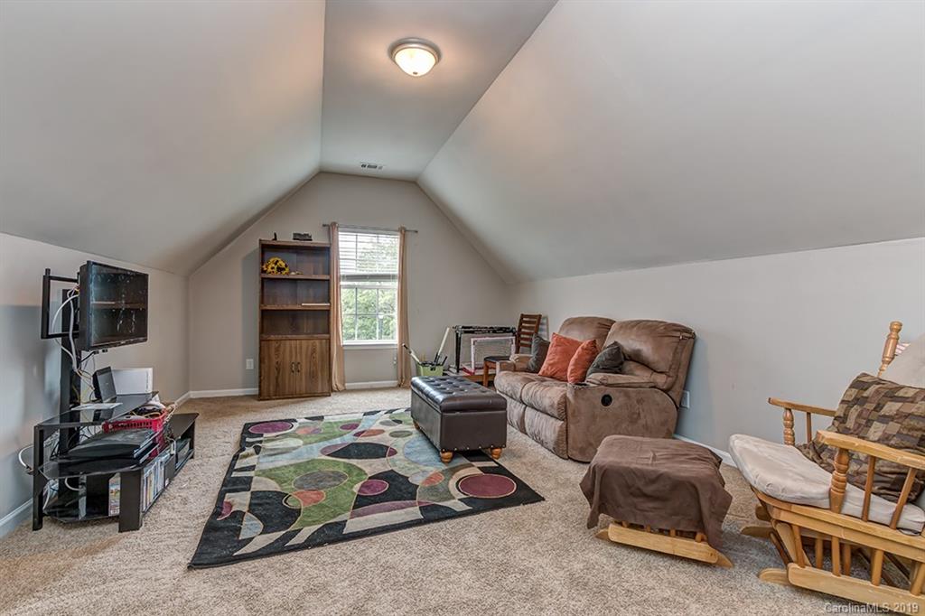 2736 Rustic Ridge Court Rock Hill, SC 29730 - Photo 8 of 23 a bedroom with furniture and a window