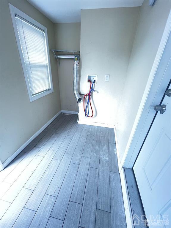 9 Christopher Street, Unit 2 Carteret, NJ 07008 - Photo 12 of 15 a view of wooden floor in a room