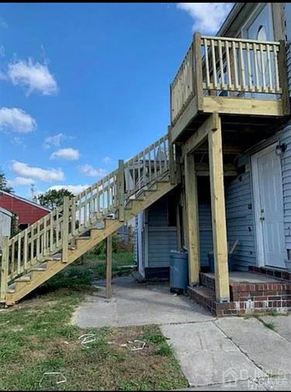 9 Christopher Street, Unit 2 Carteret, NJ 07008 - Photo 3 of 15 a view of a house with a yard
