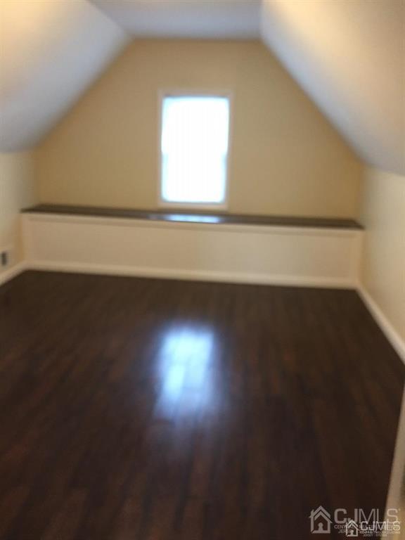 9 Christopher Street, Unit 2 Carteret, NJ 07008 - Photo 7 of 15 a view of a room with an empty space and a window