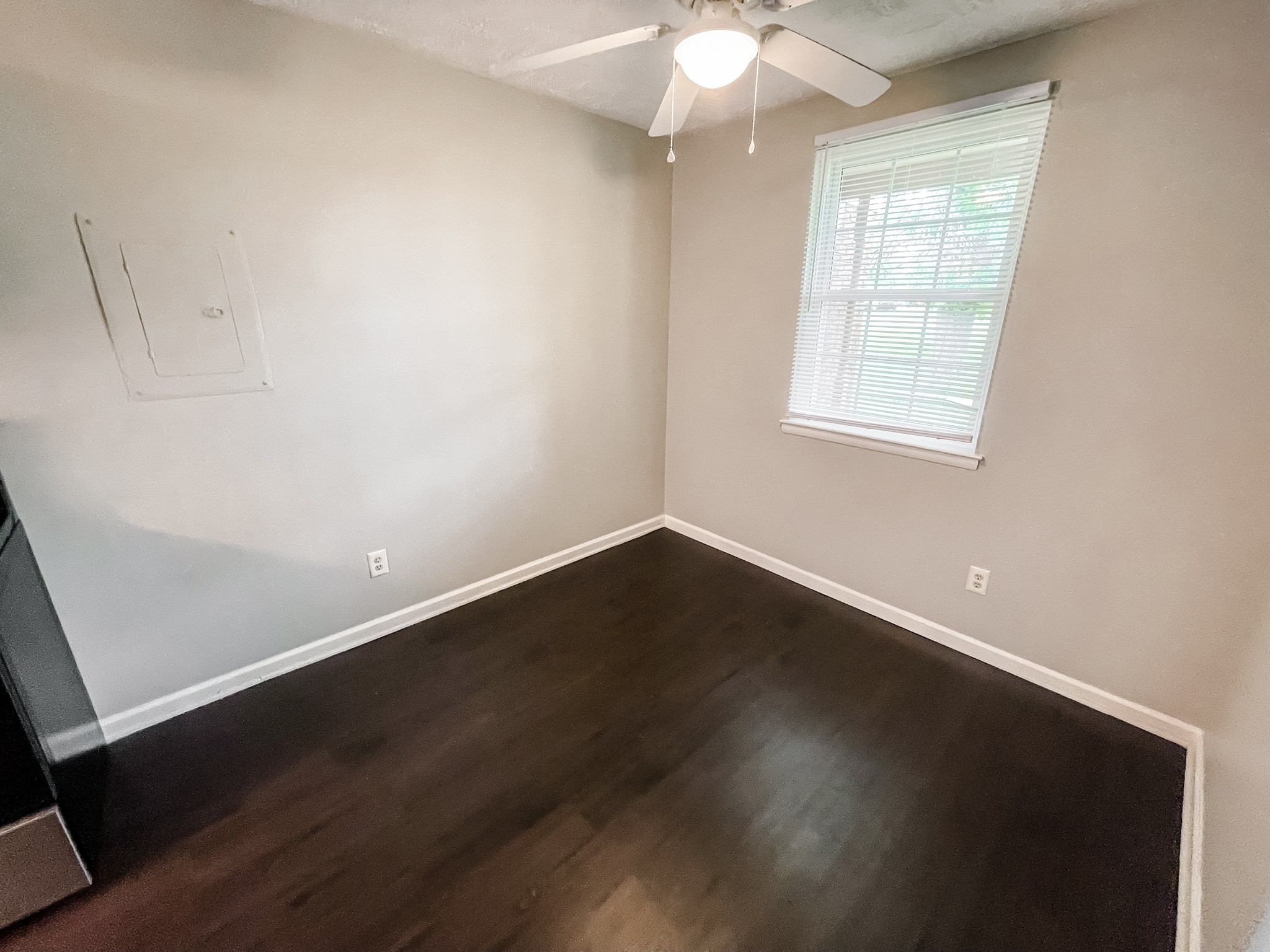 1301 Neelys Bend Road, Unit 45 Madison, TN 37115 - Photo 8 of 19 an empty room with wooden floor and windows
