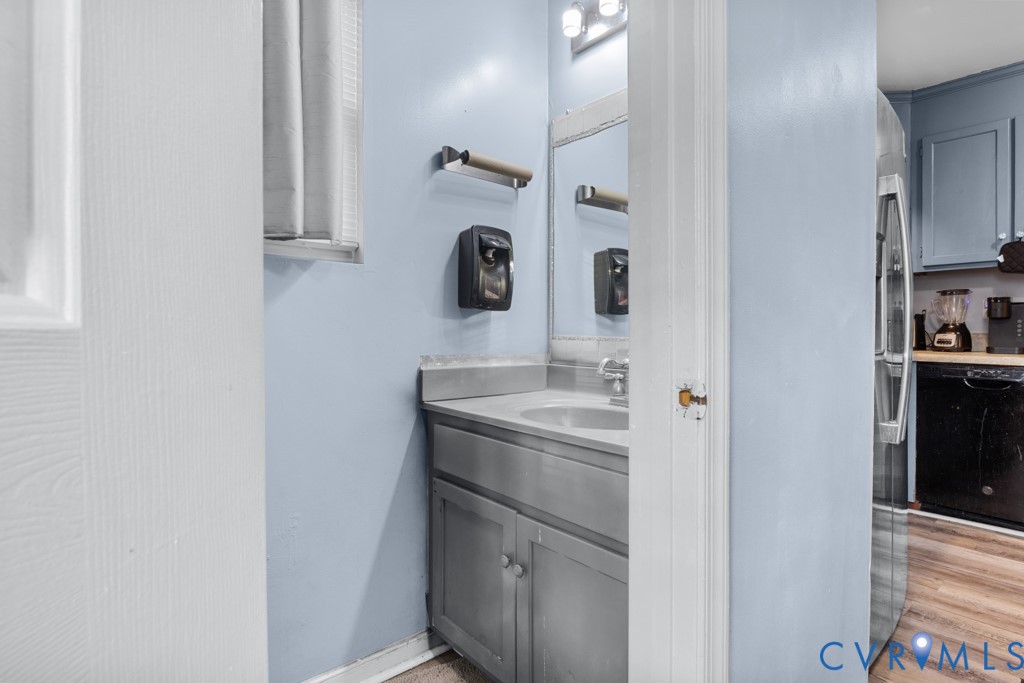4025 Frye Terrace Colonial Heights, VA 23834 - Photo 8 of 14 Compact powder room featuring a single vanity with