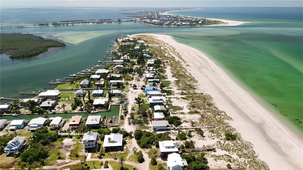 9502 Alborado Road Placida, FL 33946 - Photo 11 of 61 a view of a lake with a city