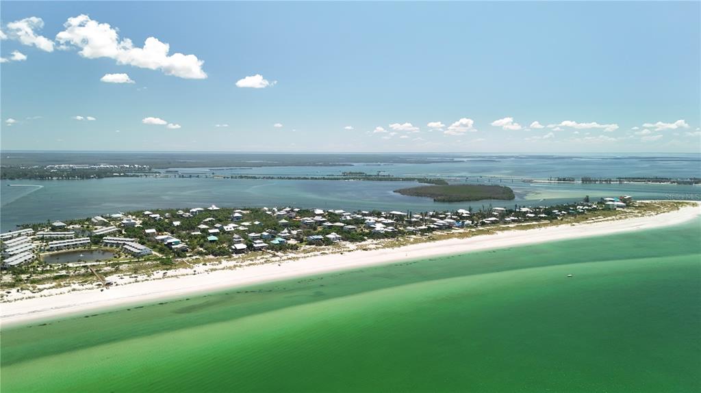 9502 Alborado Road Placida, FL 33946 - Photo 29 of 61 a view of a lake and a yard
