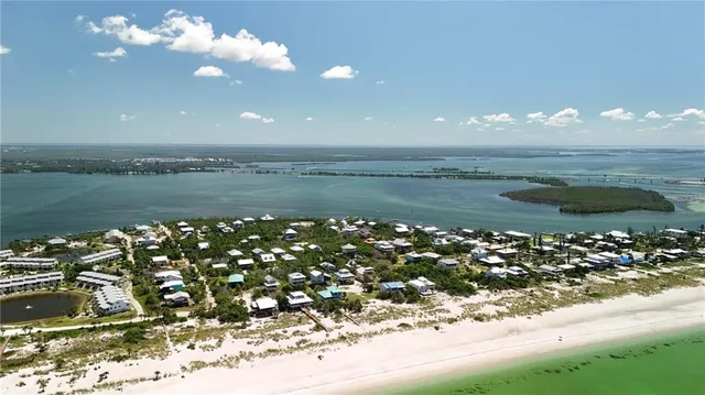 a view of a lake with a yard