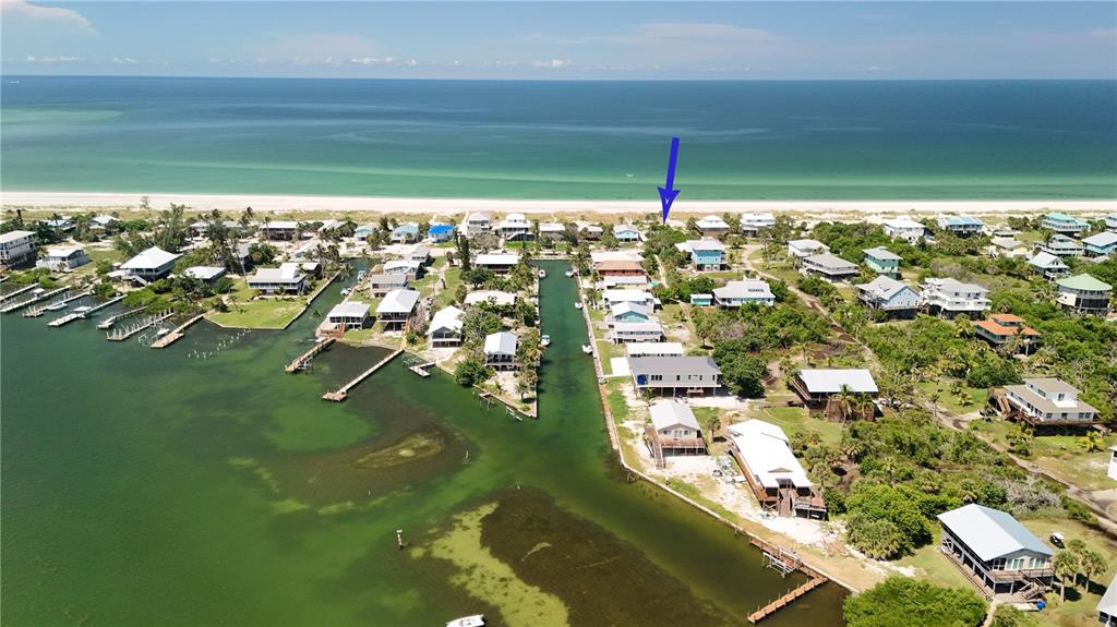 9502 Alborado Road Placida, FL 33946 - Photo 3 of 61 a view of residential houses with outdoor space