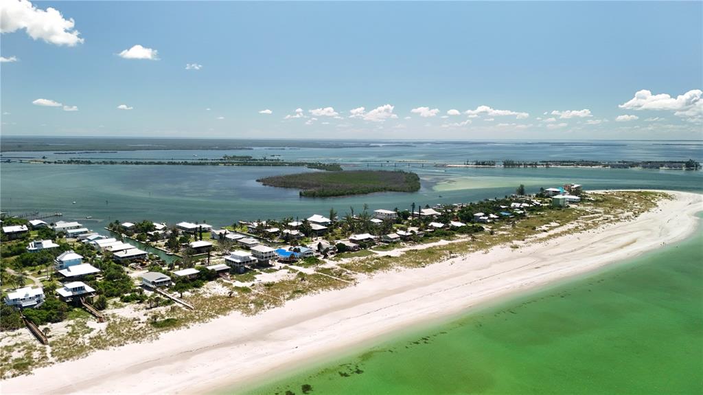 9502 Alborado Road Placida, FL 33946 - Photo 32 of 61 a view of a lake with a mountain