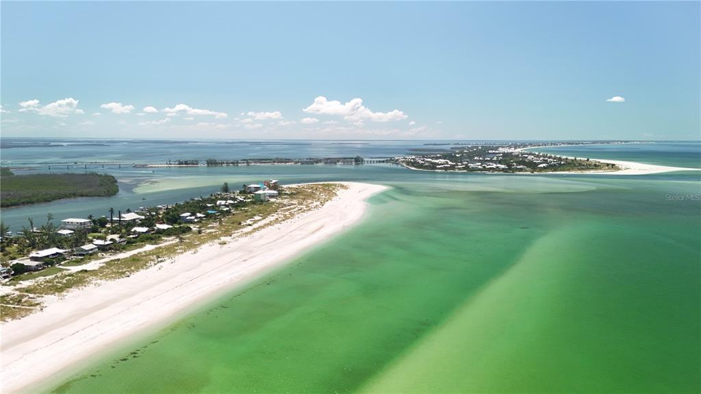 9502 Alborado Road Placida, FL 33946 - Photo 33 of 61 a view of a lake with a mountain