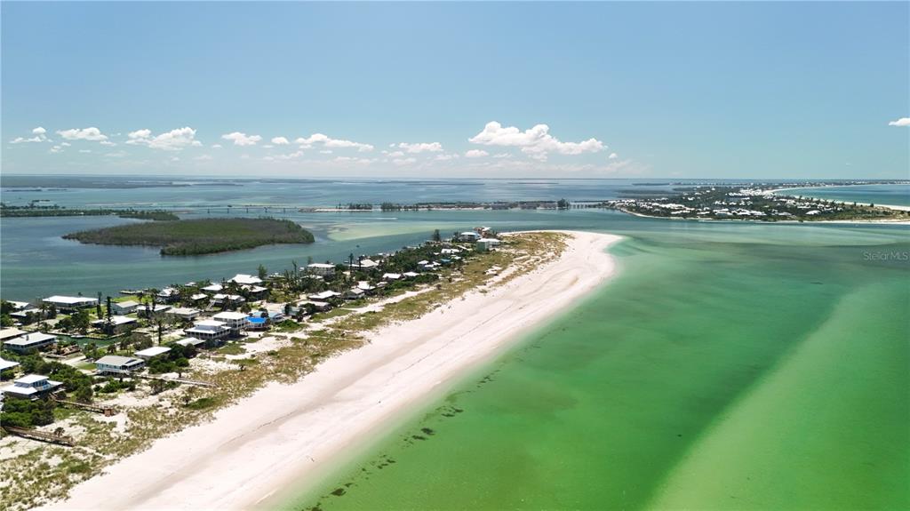 9502 Alborado Road Placida, FL 33946 - Photo 34 of 61 a view of a lake with a mountain