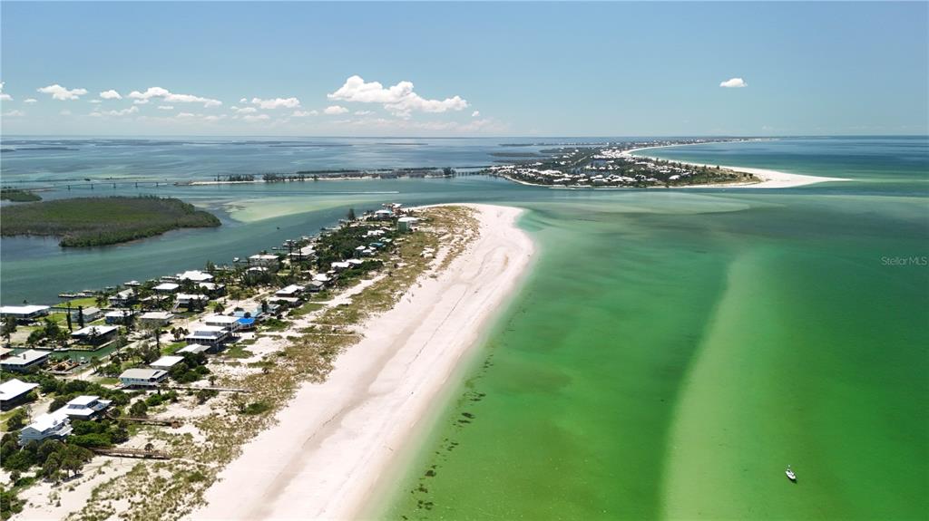 9502 Alborado Road Placida, FL 33946 - Photo 36 of 61 a view of a lake from a balcony