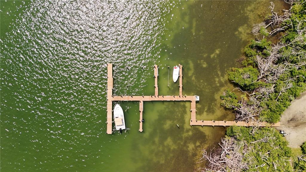 9502 Alborado Road Placida, FL 33946 - Photo 38 of 61 a view of a lake with a yard