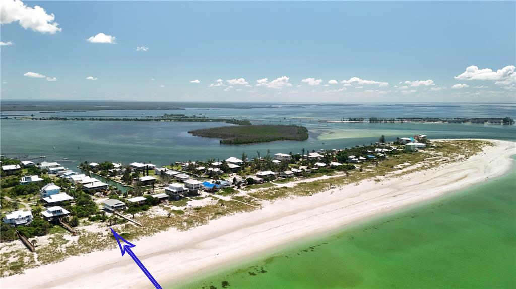 9502 Alborado Road Placida, FL 33946 - Photo 46 of 61 a view of a lake from a yard