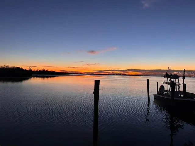 a view of a backyard of the house