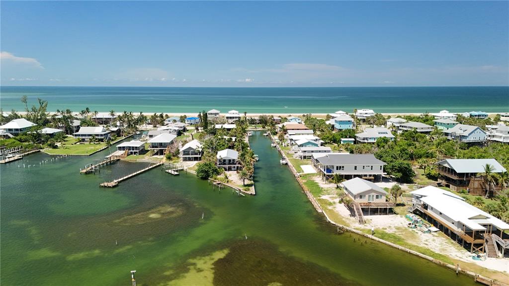 9502 Alborado Road Placida, FL 33946 - Photo 6 of 61 an aerial view of a house with a ocean view