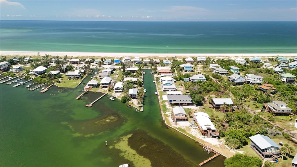 9502 Alborado Road Placida, FL 33946 - Photo 8 of 61 a view of residential houses with outdoor space