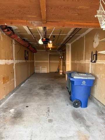 a view of a room with wooden shelves