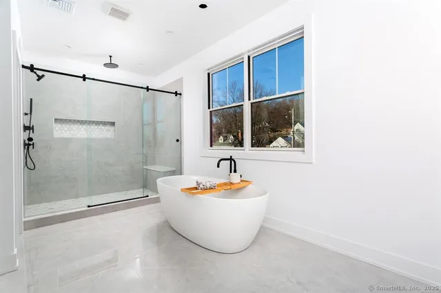a view of a bathtub in a bathroom