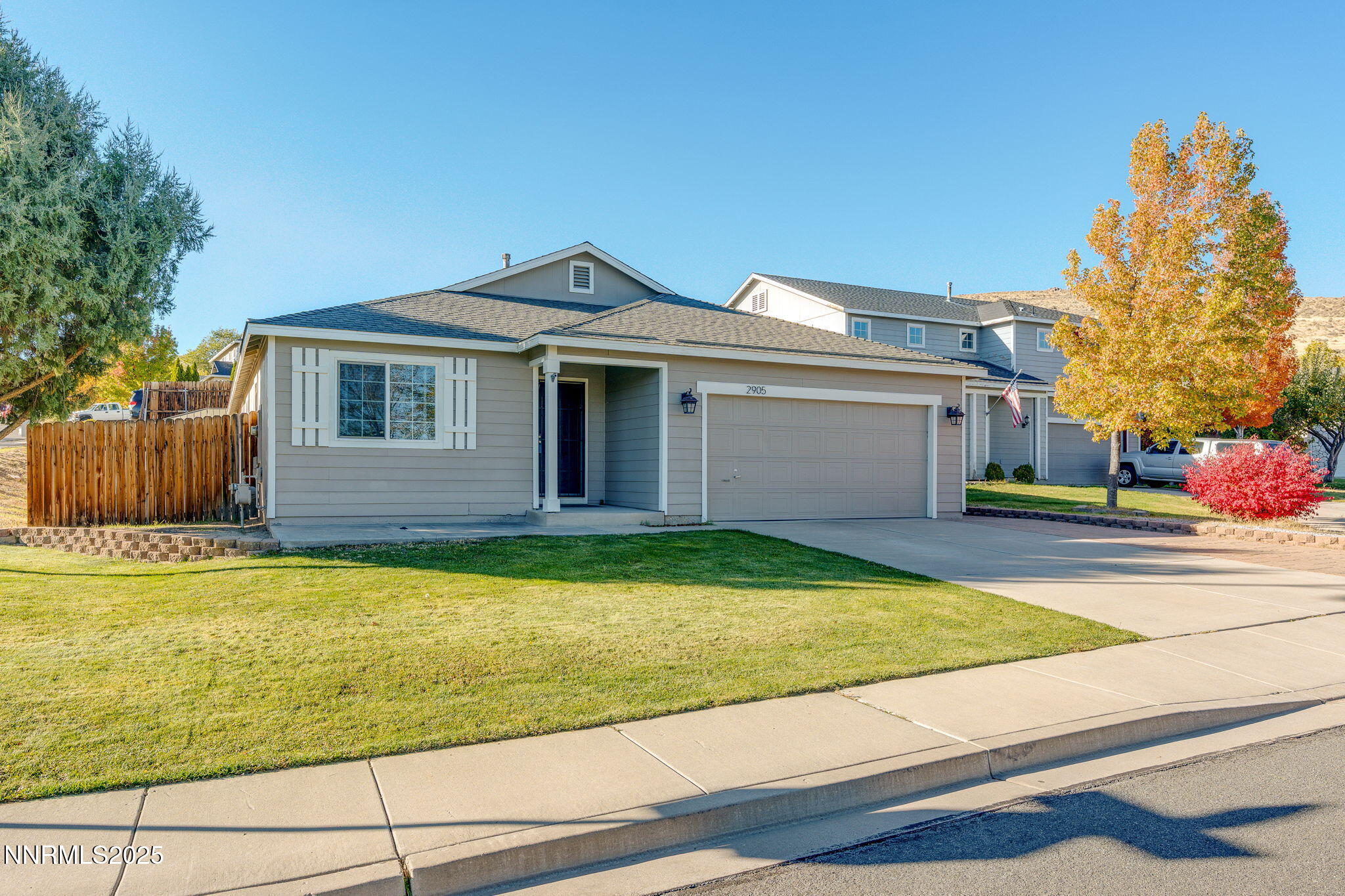 2905 Scepter Court Reno, NV 89503 - Photo 2 of 30 a front view of a house with garden