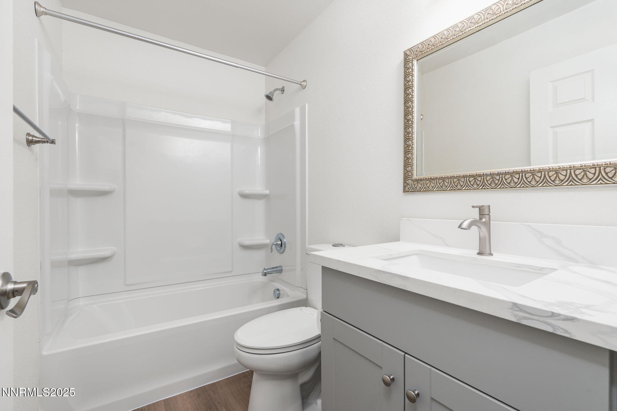 2905 Scepter Court Reno, NV 89503 - Photo 25 of 30 a bathroom with a sink a toilet and shower