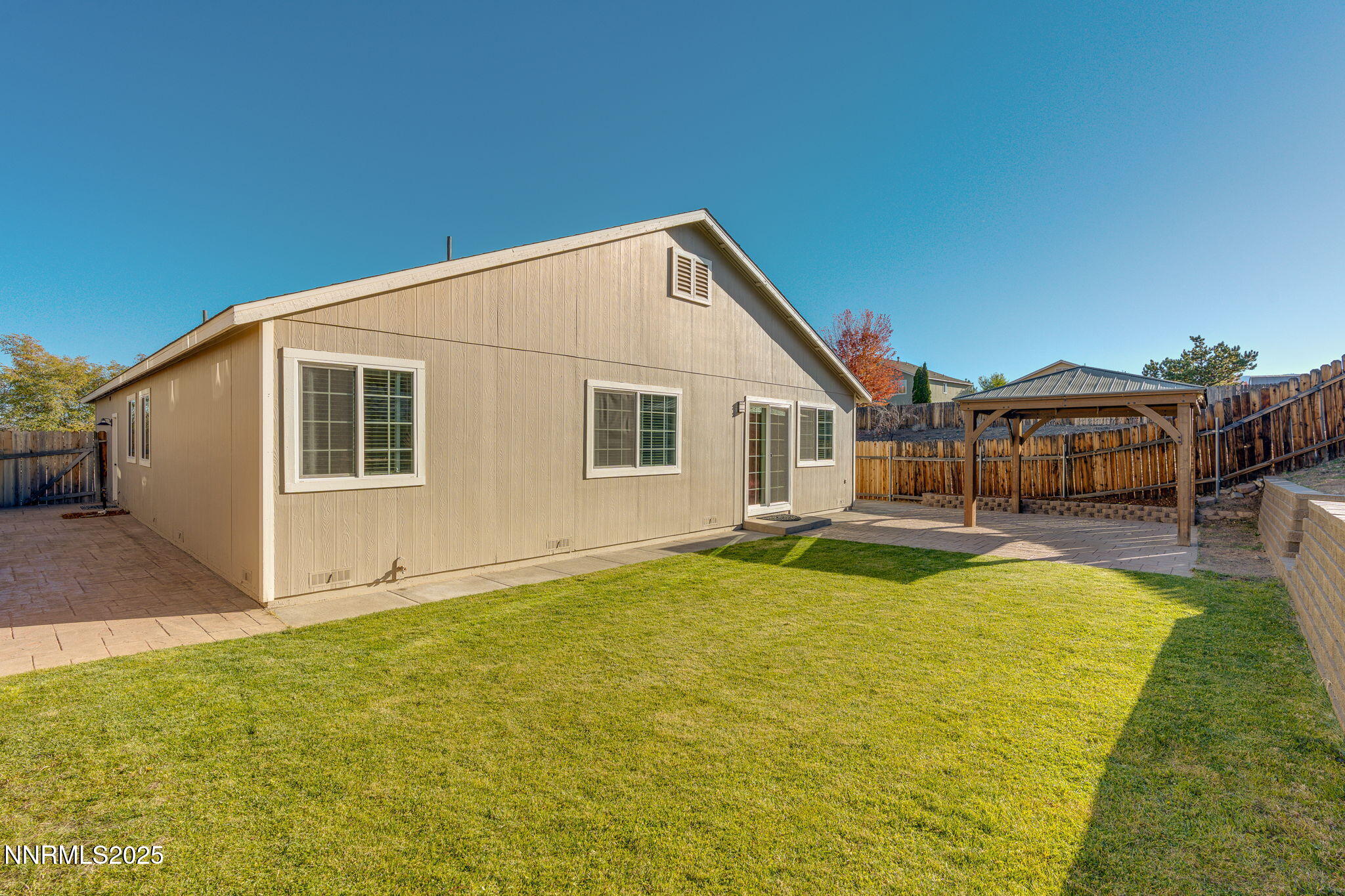 2905 Scepter Court Reno, NV 89503 - Photo 27 of 30 a view of a house with swimming pool in front of it