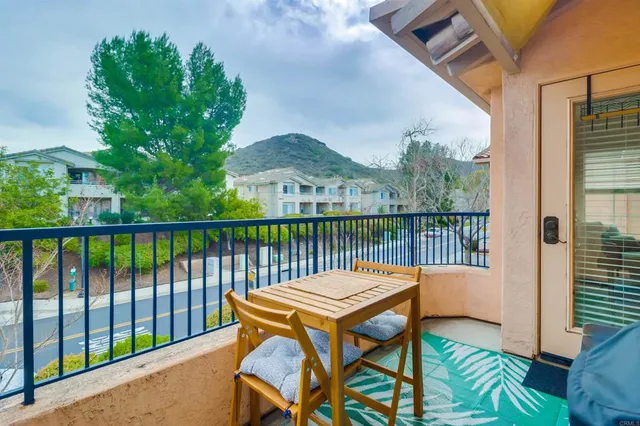 a bathroom with a double vanity sink mirror and shower