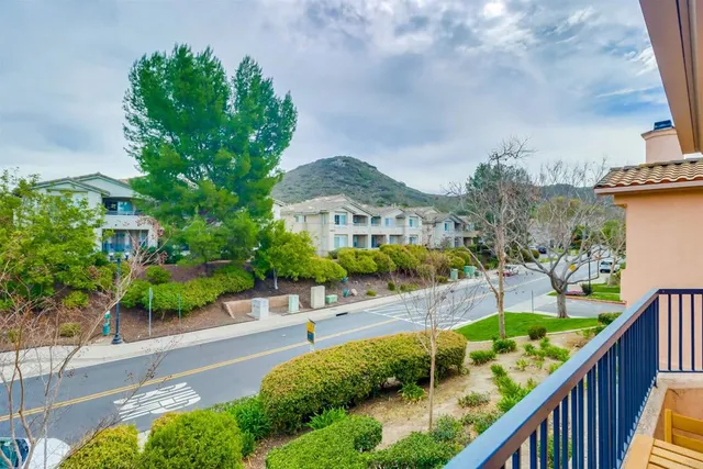 a bathroom with a double vanity sink mirror and toilet