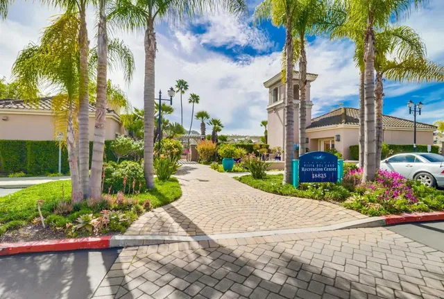 a view of a swimming pool with a yard