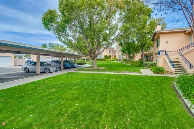 a view of a house with a big yard