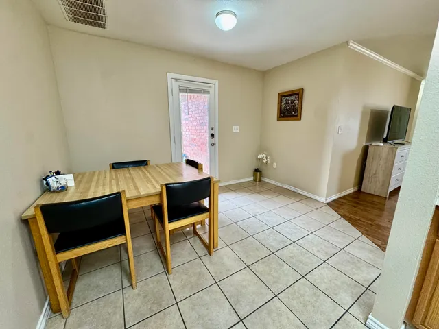 a workspace with furniture and window