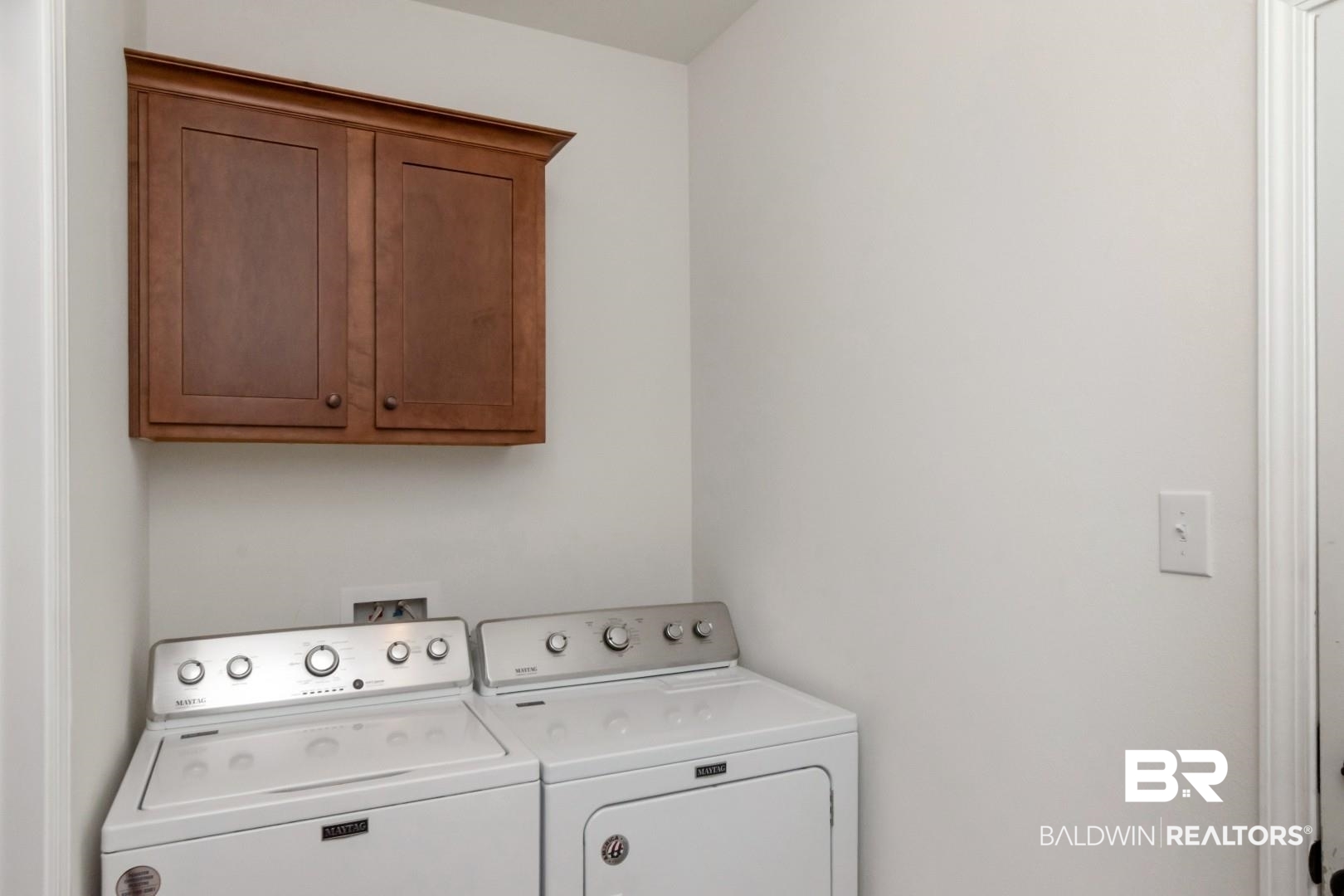 10714 Brodick Loop Spanish Fort, AL 36527 - Photo 19 of 26 Laundry room with washing machine and dryer and cabinet space