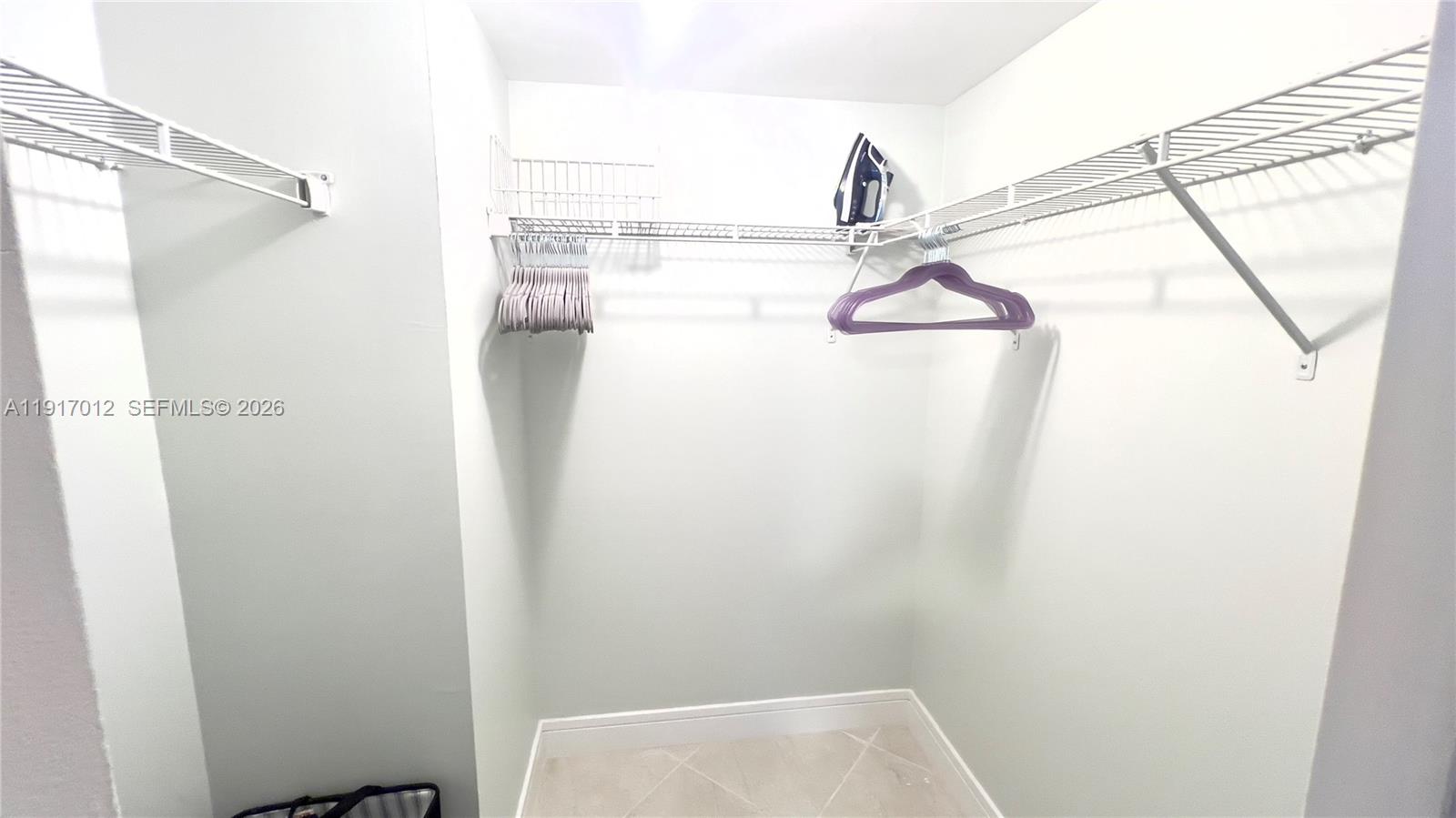 4380 27th Court Southwest, Unit 1104 Naples, FL 34116 - Photo 12 of 22 a bathroom with a shower