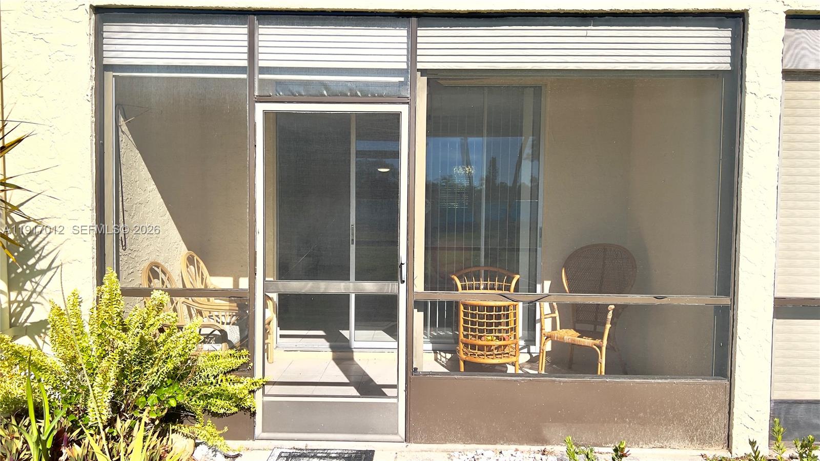 4380 27th Court Southwest, Unit 1104 Naples, FL 34116 - Photo 15 of 22 a picture of a door of a house