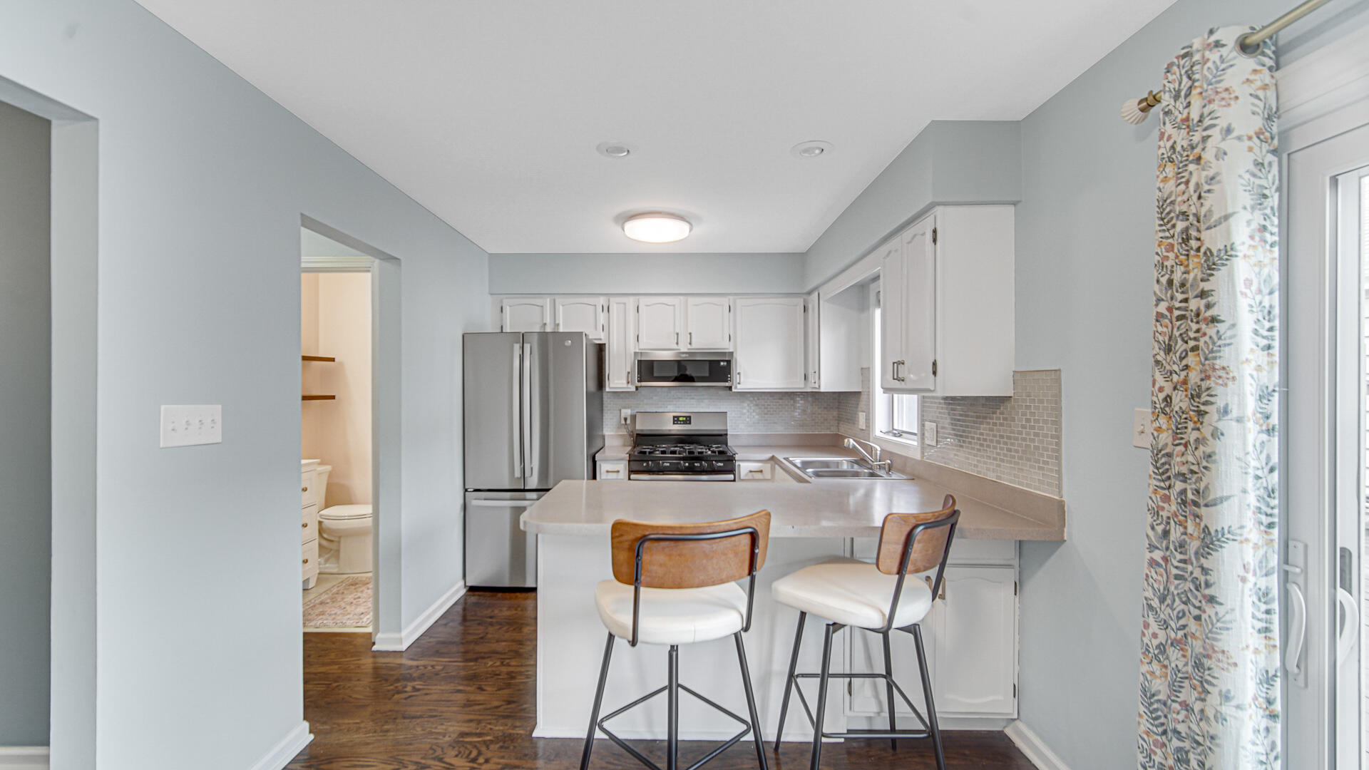 771 Kenmare Parkway Crown Point, IN 46307 - Photo 3 of 20 a kitchen with stainless steel appliances kitchen island granite countertop a refrigerator and microwave