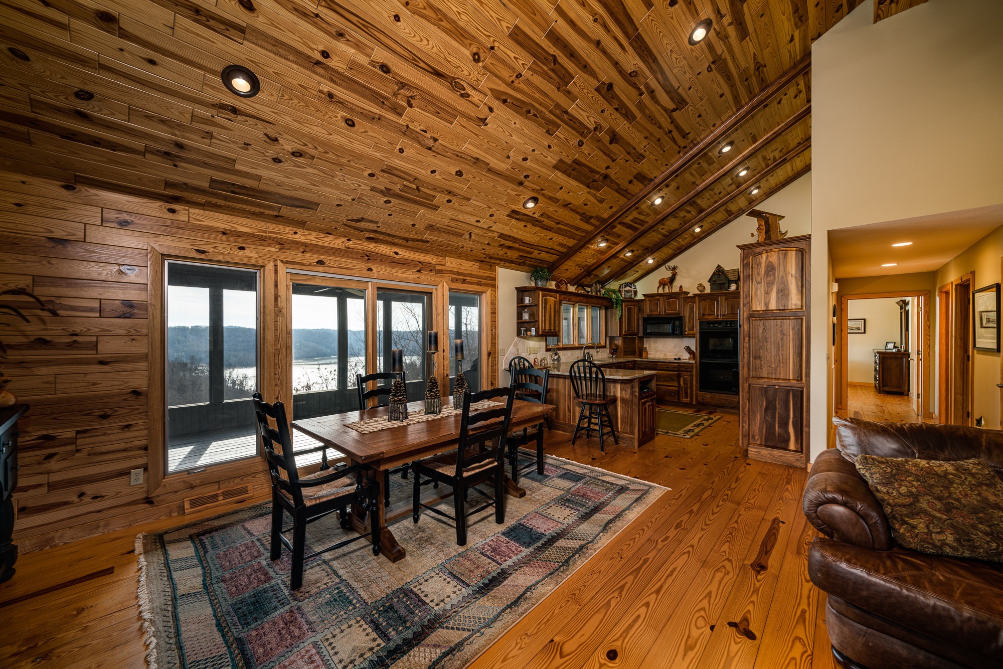 533 Mallard Pointe Road Byrdstown, TN 38549 - Photo 15 of 34 a view of a dining room with furniture window and outside view