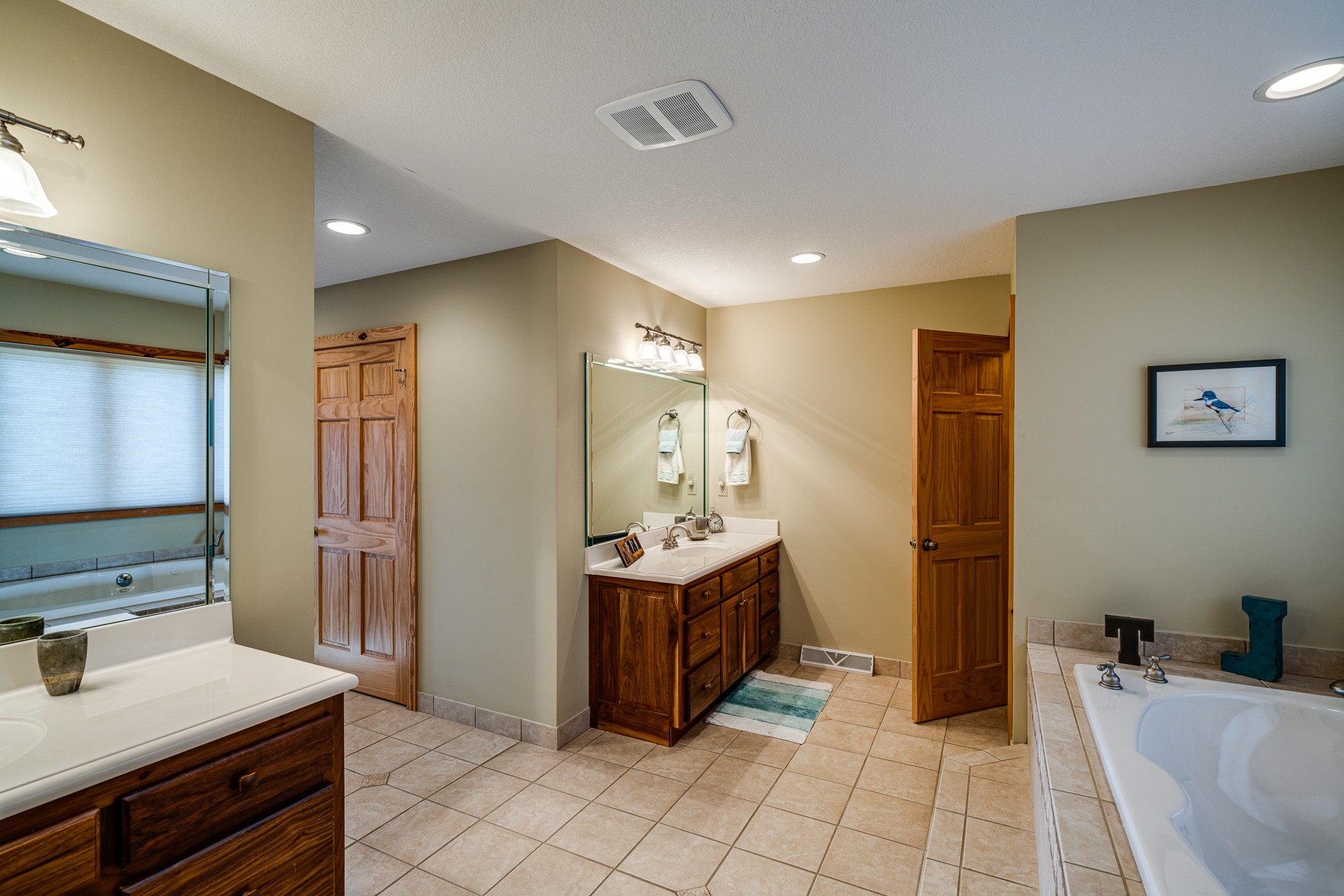 533 Mallard Pointe Road Byrdstown, TN 38549 - Photo 21 of 34 a kitchen with stainless steel appliances kitchen island sink refrigerator and stove