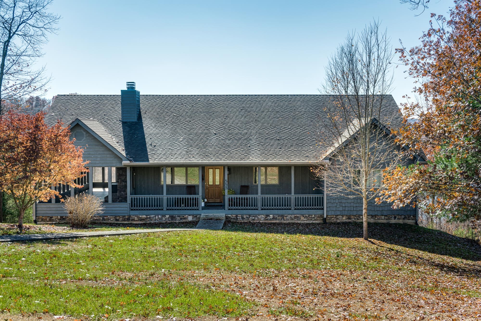 533 Mallard Pointe Road Byrdstown, TN 38549 - Photo 3 of 34 a front view of a house with garden