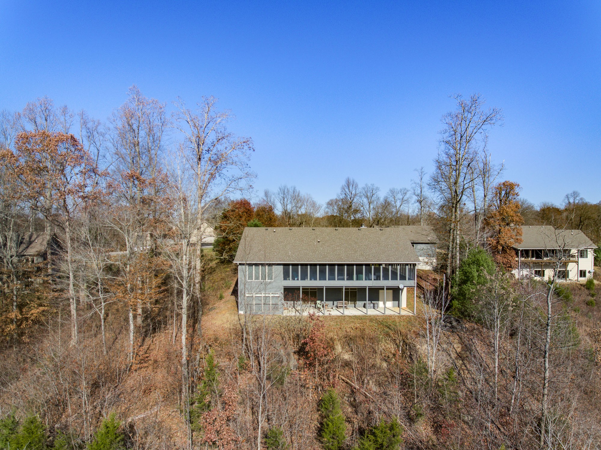 533 Mallard Pointe Road Byrdstown, TN 38549 - Photo 4 of 34 a view of a building with mountains and a big yard