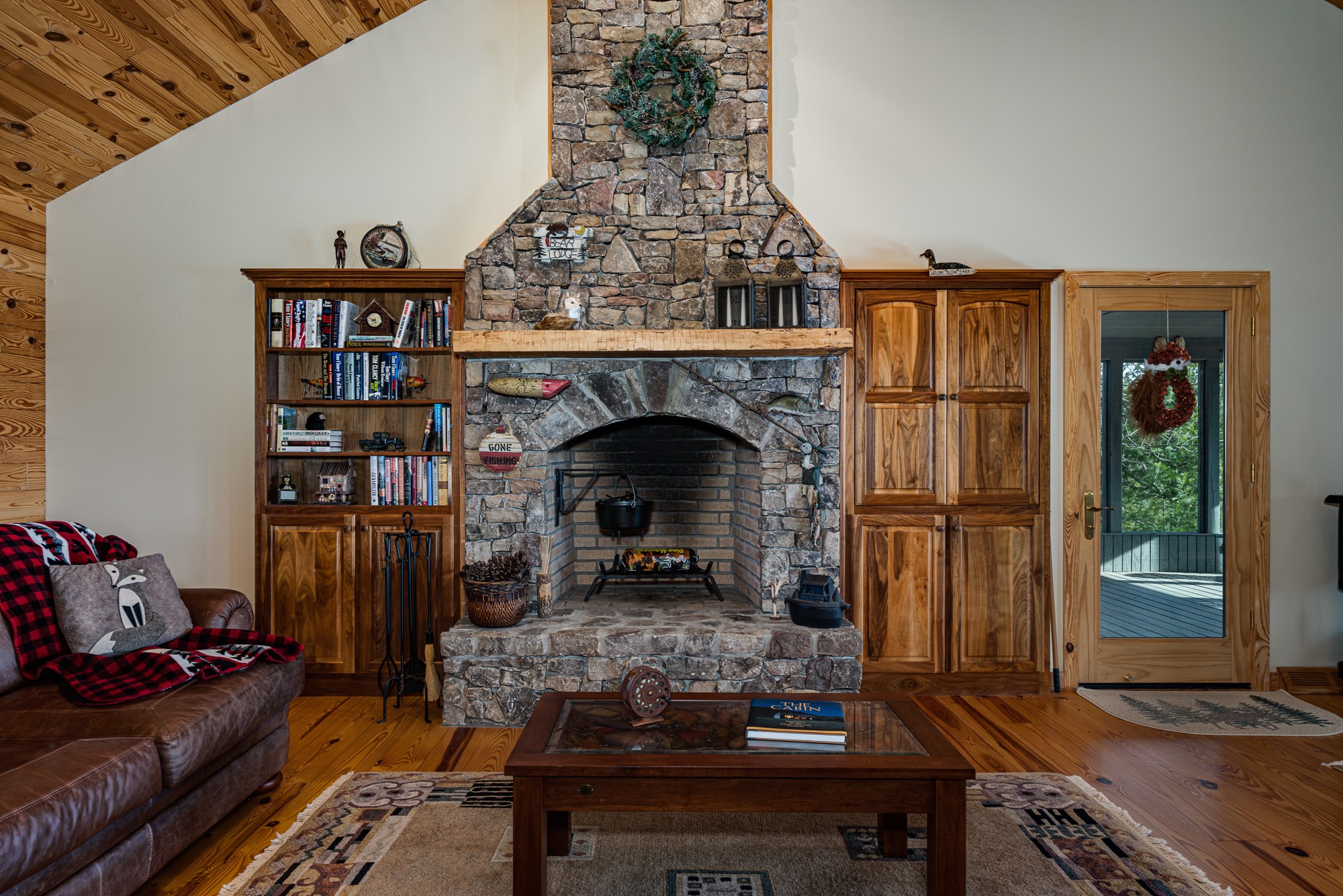 533 Mallard Pointe Road Byrdstown, TN 38549 - Photo 8 of 34 a living room with furniture and a fireplace