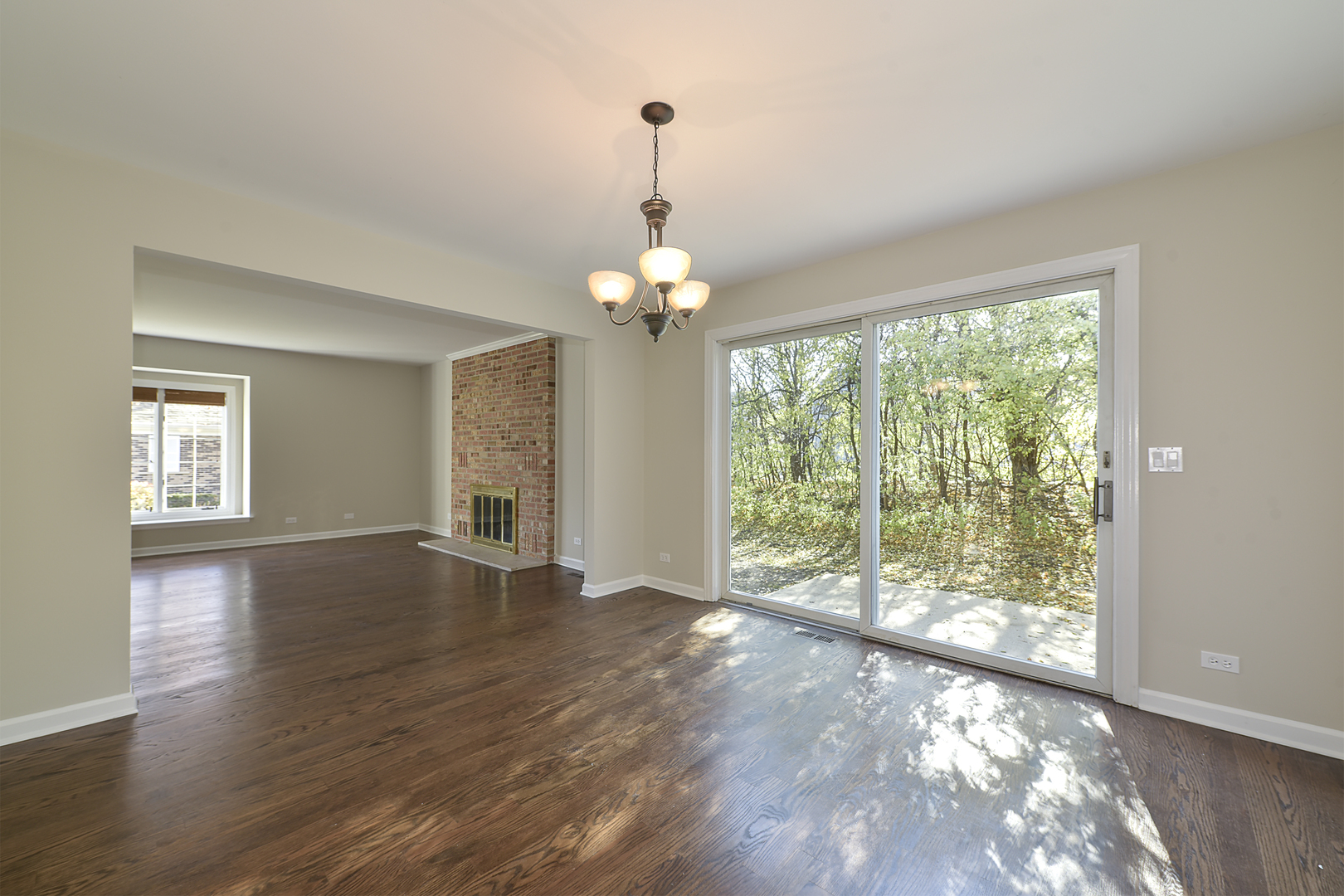 1479 West Shire Circle Inverness, IL 60067 - Photo 4 of 19 a view of a livingroom with wooden floor and a large window